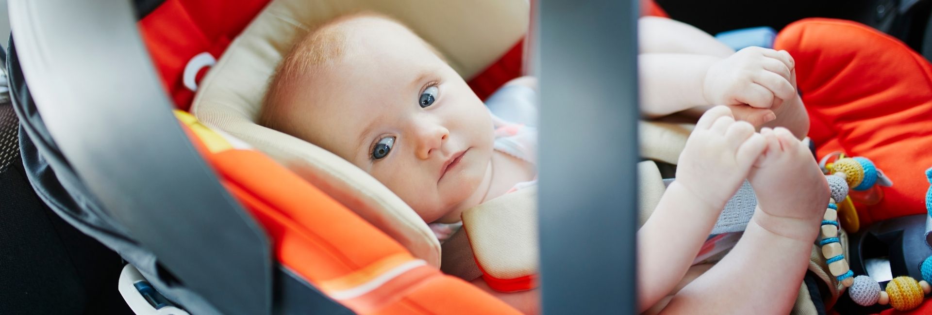 Wheel Well home header image child safe in their car seat